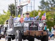 man driving old car